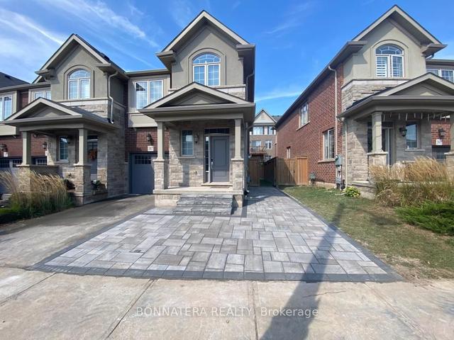 387 Wheat Boom Dr, House attached with 3 bedrooms, 3 bathrooms and 3 parking in Oakville ON | Image 1