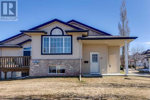 59, - 103 Addington Drive, House attached with 2 bedrooms, 1 bathrooms and 2 parking in Red Deer AB | Card Image