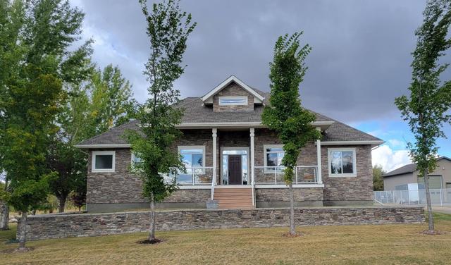 7942 Carriage Lane Drive, House detached with 5 bedrooms, 3 bathrooms and 8 parking in Grande Prairie County No. 1 AB | Image 2