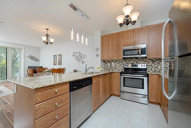 218 - 33 Whitmer St, Condo with 2 bedrooms, 2 bathrooms and 1 parking in Milton ON | Image 6