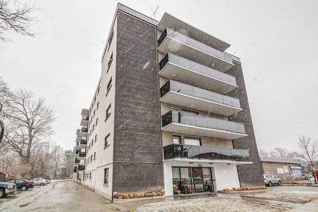 201 - 2411 New St, Condo with 2 bedrooms, 1 bathrooms and 1 parking in Burlington ON | Image 1