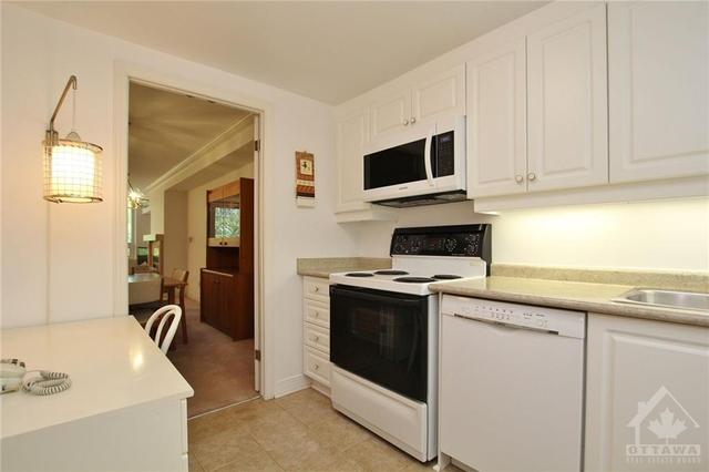 105 - 3099 Carling Avenue, Condo with 2 bedrooms, 2 bathrooms and 1 parking in Ottawa ON | Image 6