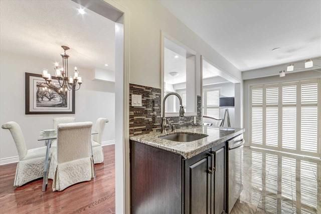 9 Rivitt Pl, House attached with 3 bedrooms, 3 bathrooms and 4 parking in Toronto ON | Image 4