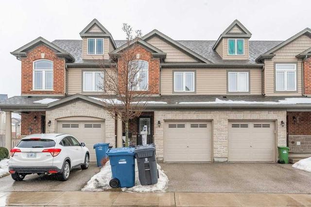 35 Oldfield Dr, Townhouse with 3 bedrooms, 3 bathrooms and 2 parking in Guelph ON | Image 1