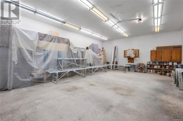 Workshop 30’ Wide x 70’ Long – 10’ Height •Fully Finished inside with 4 inch Concrete Slab Floor •Pro Lock Metal Roof  & Leaf Guard Gutters in Sept 2020 •WETT Certified Woodstove (Nov 2020) and | Image 81