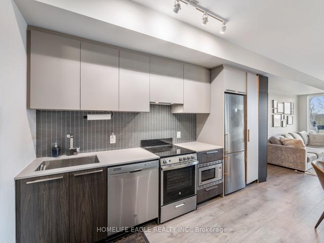 409 - 20 Brin Dr, Condo with 1 bedrooms, 2 bathrooms and 1 parking in Toronto ON | Image 8