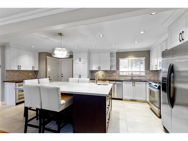 3657 Sefton Street, House detached with 4 bedrooms, 3 bathrooms and null parking in Port Coquitlam BC | Card Image
