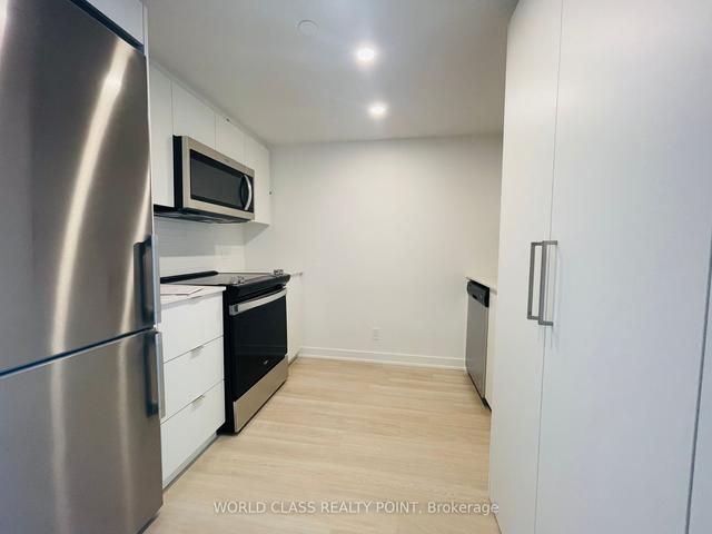 715 - 30 Tretti Way, Condo with 2 bedrooms, 2 bathrooms and 1 parking in Toronto ON | Image 7