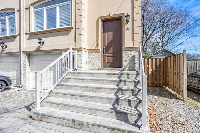 61 Long Branch Ave, House semidetached with 3 bedrooms, 4 bathrooms and 3 parking in Toronto ON | Image 23