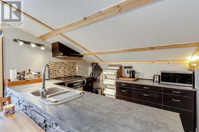 4224 Township Road 300 Townline, House detached with 2 bedrooms, 2 bathrooms and 99 parking in Mountain View County AB | Image 36