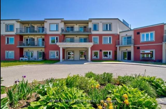 205 - 333 Rue Lafontaine Rd W, Condo with 1 bedrooms, 1 bathrooms and 1 parking in Tiny ON | Image 1