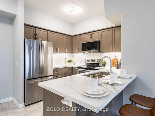 416 - 630 Sauve St, Condo with 2 bedrooms, 2 bathrooms and 1 parking in Milton ON | Image 4