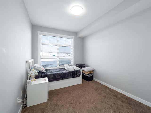 1110 - 3727 Sage Hill Drive Nw, Condo with 2 bedrooms, 2 bathrooms and 1 parking in Calgary AB | Image 14
