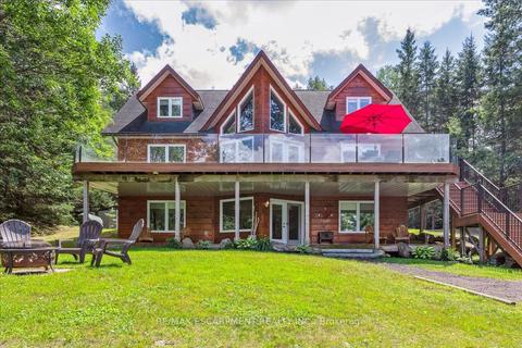 2179 Pickerel & Jack Lake Rd, House detached with 2 bedrooms, 3 bathrooms and 10 parking in Armour ON | Card Image