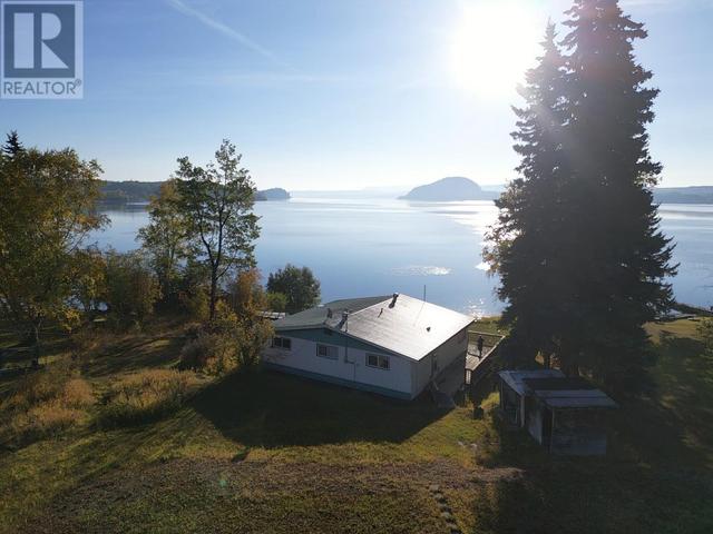 6597 Proctor Bay Frontage Road, House detached with 4 bedrooms, 2 bathrooms and null parking in Bulkley Nechako D BC | Image 1