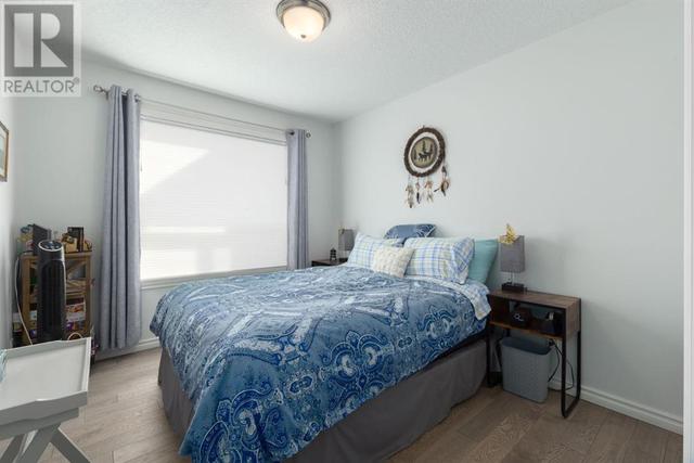 408, - 128 Centre Avenue, Condo with 2 bedrooms, 2 bathrooms and 1 parking in Cochrane AB | Image 28