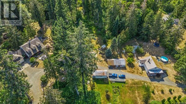 6249 Island Hwy, House detached with 3 bedrooms, 3 bathrooms and 8 parking in Comox Valley A BC | Image 12