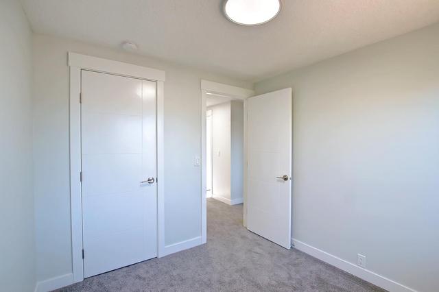 138 Castlebrook Rise Ne, Home with 3 bedrooms, 2 bathrooms and 2 parking in Calgary AB | Image 21