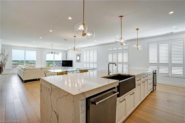 41x21 ft main room; 14x4 ft island with waterfall countertop | Image 1