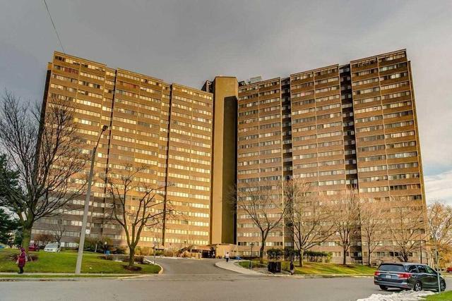 1111 - 11 Wincott Dr, Condo with 3 bedrooms, 2 bathrooms and 1 parking in Toronto ON | Image 1