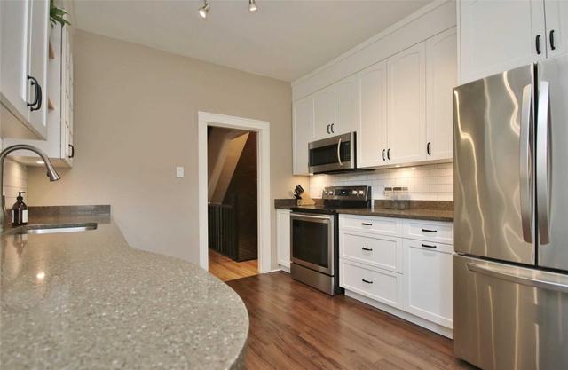 166 Concord St S, House attached with 4 bedrooms, 2 bathrooms and 2 parking in Ottawa ON | Image 2