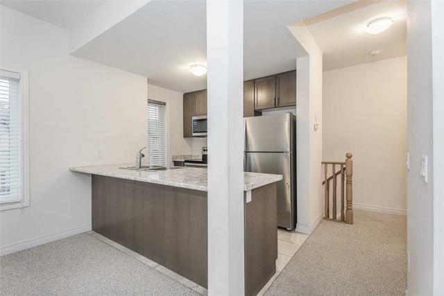 107 - 77 Diana Ave, House attached with 3 bedrooms, 2 bathrooms and 2 parking in Brantford ON | Image 2