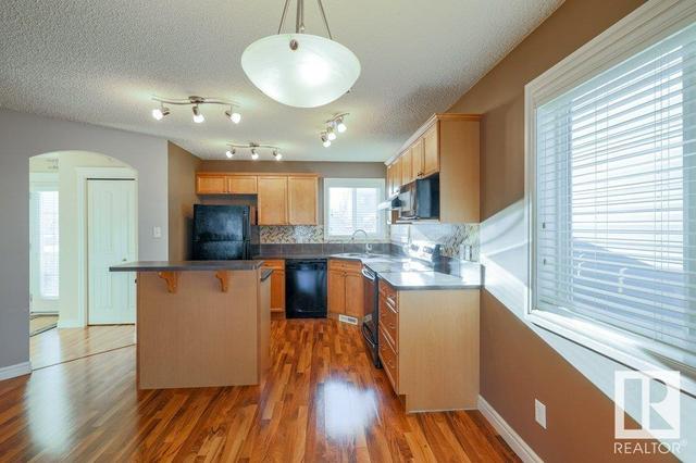 12055 19 Av Sw, House detached with 4 bedrooms, 2 bathrooms and 2 parking in Edmonton AB | Image 19