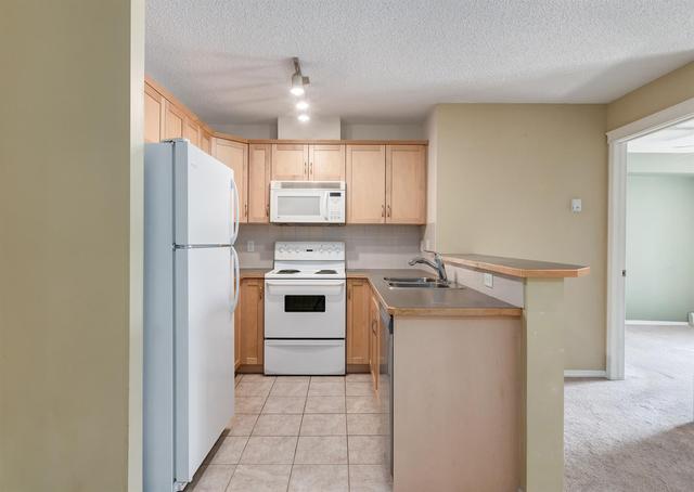 1211 - 70 Panamount Drive Nw, Condo with 2 bedrooms, 2 bathrooms and 1 parking in Calgary AB | Image 11