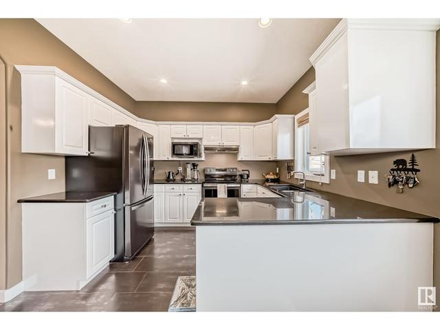 7723 111 St Nw, House semidetached with 4 bedrooms, 3 bathrooms and 4 parking in Edmonton AB | Image 10