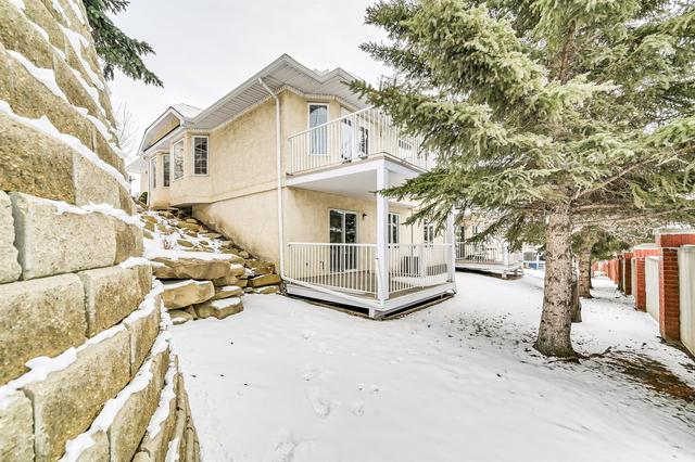 151 Sienna Park Green Sw, Home with 2 bedrooms, 2 bathrooms and 4 parking in Calgary AB | Image 34