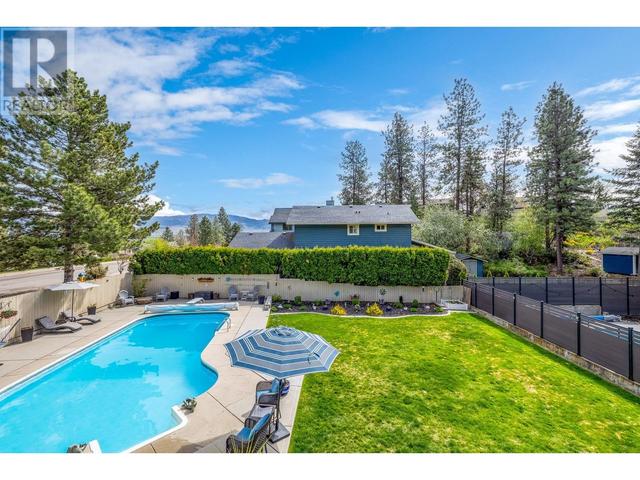 1047 Cascade Place, House detached with 4 bedrooms, 2 bathrooms and 6 parking in Kelowna BC | Image 40