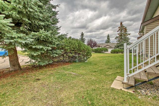 38 Tararidge Circle Ne, Home with 2 bedrooms, 2 bathrooms and 2 parking in Calgary AB | Image 34