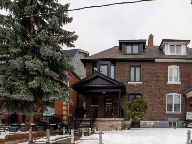 28 Beatrice St, House semidetached with 2 bedrooms, 1 bathrooms and 0 parking in Toronto ON | Image 1