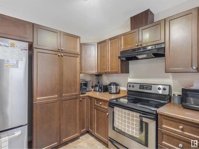 1 - 11841 97 St Nw, House attached with 3 bedrooms, 2 bathrooms and null parking in Edmonton AB | Image 23