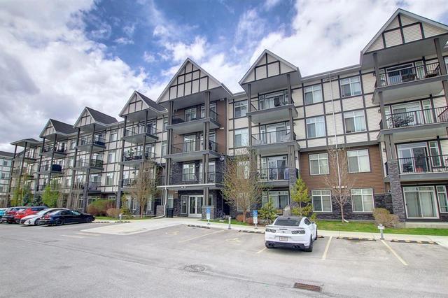 102, - 6703 New Brighton Avenue Se, Condo with 2 bedrooms, 2 bathrooms and 2 parking in Calgary AB | Card Image