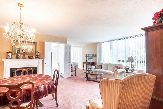 404 - 1230 Marlborough Crt, Condo with 2 bedrooms, 2 bathrooms and 1 parking in Oakville ON | Image 1