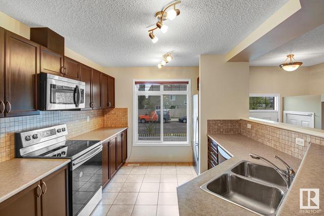 12 - 1804 70 St Sw, House attached with 3 bedrooms, 2 bathrooms and 2 parking in Edmonton AB | Card Image