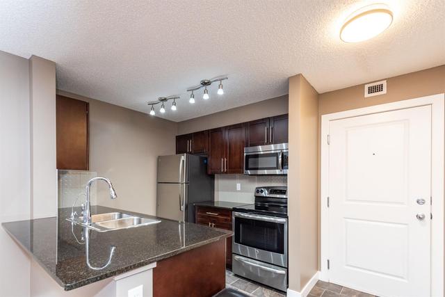 9105 - 403 Mackenzie Way Sw, Condo with 2 bedrooms, 2 bathrooms and 1 parking in Calgary AB | Image 4