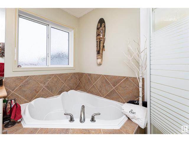 9309 106 Av, House detached with 4 bedrooms, 2 bathrooms and null parking in Morinville AB | Image 27