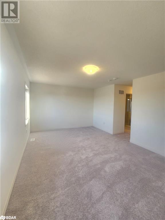 large bedroom with carpet | Image 12