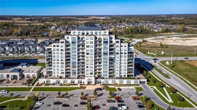 404 - 240 Villagewalk Blvd, Condo with 3 bedrooms, 2 bathrooms and 1 parking in London ON | Image 1