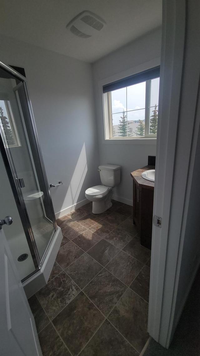 261 Ranch Ridge Meadow, Home with 3 bedrooms, 2 bathrooms and 1 parking in Strathmore AB | Image 16