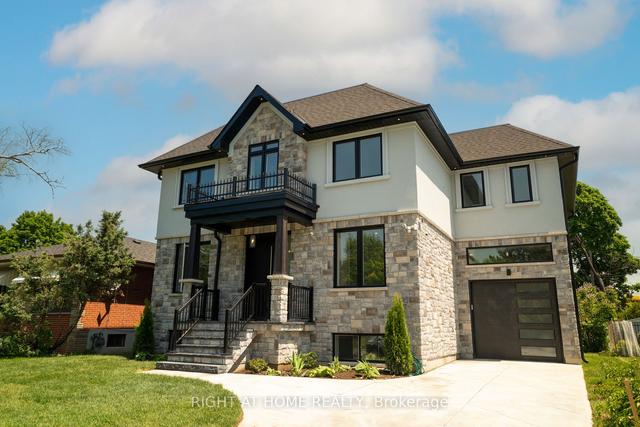 29 Brampton Rd, House detached with 4 bedrooms, 5 bathrooms and 3 parking in Toronto ON | Image 1