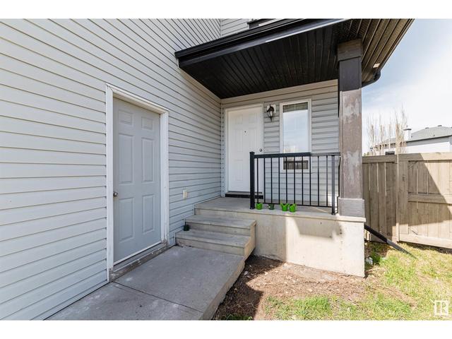 7716 8 Av Sw, House detached with 4 bedrooms, 3 bathrooms and null parking in Edmonton AB | Image 3