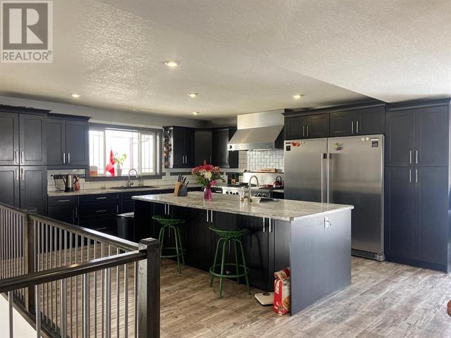 225041 690, House detached with 5 bedrooms, 3 bathrooms and 15 parking in Northern Lights County AB | Image 9