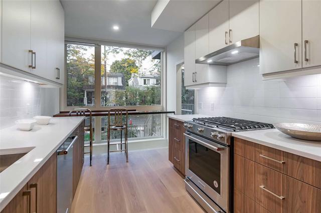213 Chatham Ave, House semidetached with 2 bedrooms, 4 bathrooms and 2 parking in Toronto ON | Image 3