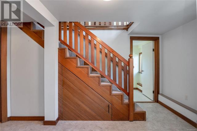 entry of home, stairs to upper main floor | Image 9