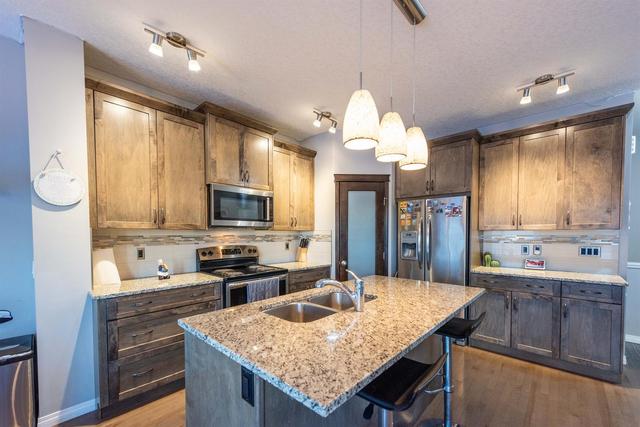 20 Hillcrest Link Sw, House detached with 3 bedrooms, 2 bathrooms and 4 parking in Calgary AB | Image 9