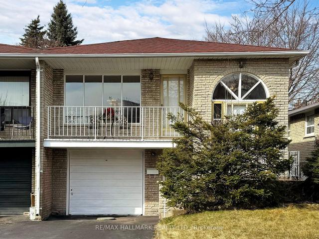 129 Sexton Cres, House semidetached with 3 bedrooms, 2 bathrooms and 3 parking in Toronto ON | Image 12