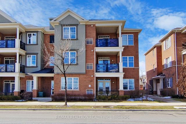 102 - 2326 Taunton Rd, Townhouse with 1 bedrooms, 1 bathrooms and 2 parking in Oakville ON | Image 1